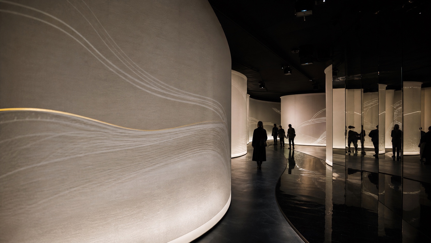 Visitors moving through an immersive brand experience concept.